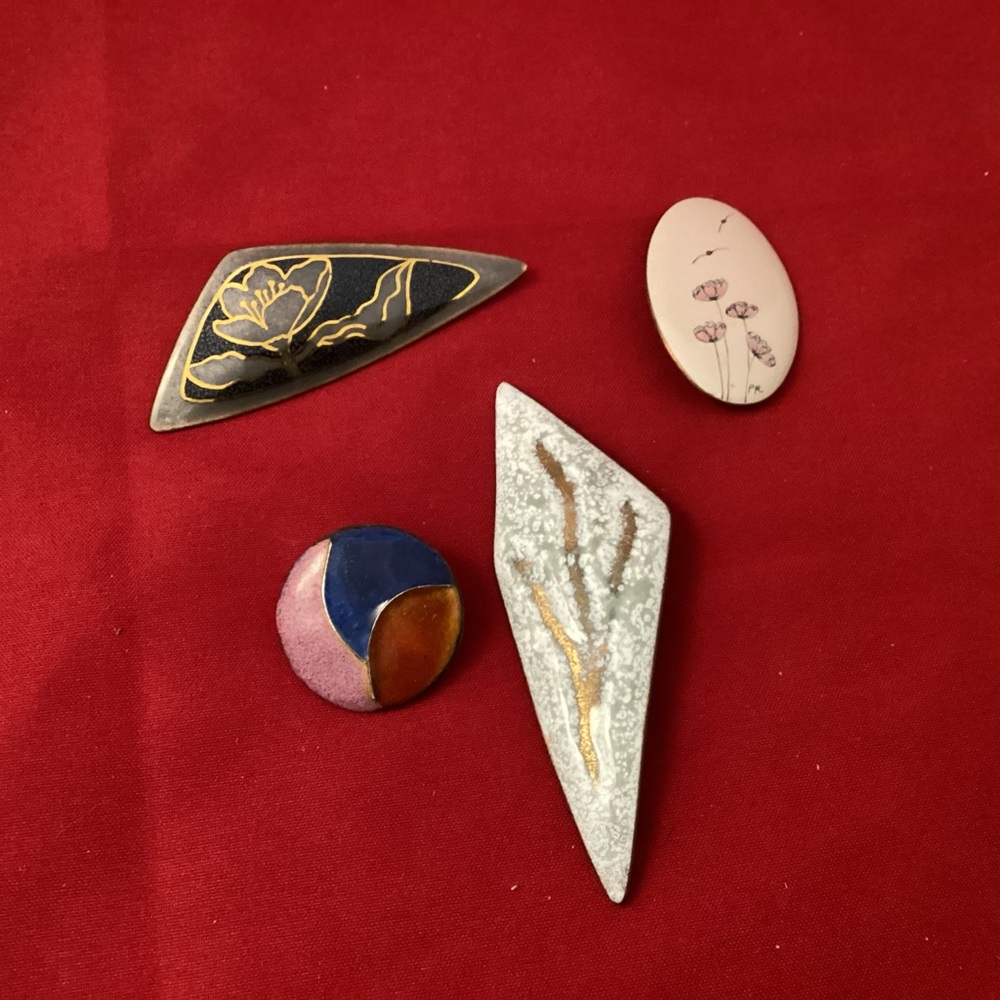 Four enamel on copper brooches lot